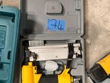 a box with a hammer and a nail gun in it