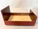 an old wooden box with a wooden tray on top of it