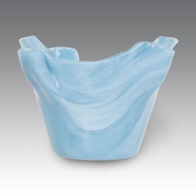 an image of a blue bowl on a gray background