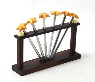 a wooden stand with a bunch of knives on it