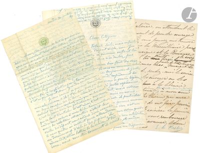 three old letters are sitting on top of a piece of paper