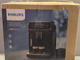 Machine à expresso Philips dans son emballage, posée sur une table
