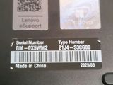 a close up of a laptop with a qr code on it
