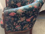 a chair that is sitting in the corner of a room