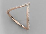 a rose gold triangle ring with diamonds on top