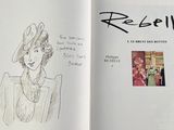 an open book with a drawing of a woman in a hat on it