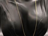 a gold chain necklace on a mannequin mannequin mannequin mannequin mannequin mannequin mannequin mannequin manne