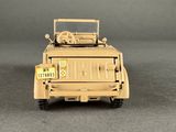 a toy army vehicle with a license plate on the back