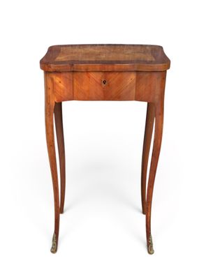 a small wooden table with a drawer on top of it