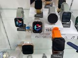 many different types of watches on display in a glass case