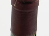 a bottle of wine that is sitting on a table