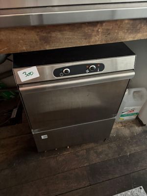 an image of a kitchen with a stove and dishwasher