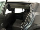 a car that has its door open and the seats down