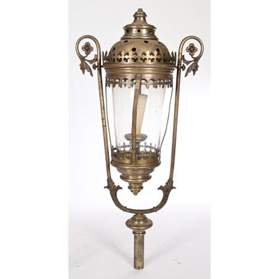 an old fashioned brass lantern with a clear glass shade