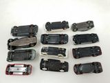 a lot of toy cars that are sitting on a table