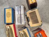 a lot of old radio ' s that are on the ground