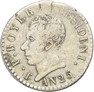 a silver coin with a woman ' s head on it