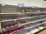 a lot of food on the shelves in the store