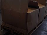 a large box on a pallet in a warehouse