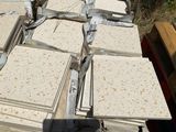 a lot of white marble slabs on the ground
