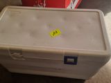 a white box that has a yellow sticker on it