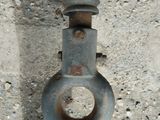 a close up of an old rusty pipe on the ground