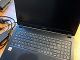 a laptop computer that is sitting on a table