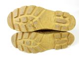 two pairs of shoes are shown on a white surface