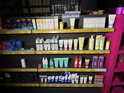many different types of skin care products on the shelves