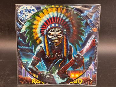 an image of a picture of a man with a headdress playing an electric guitar