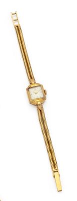 an image of a gold wrist watch with a chain on a white background