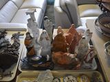 a tray of figurines on a table in a living room