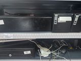 a lot of electronics on the shelves in the store