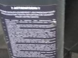 a parking meter that has a sticker on it