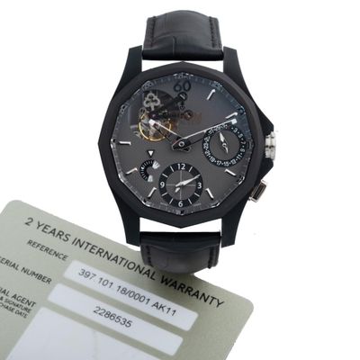 a watch that is on top of a card with a price tag