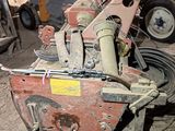 a machine that is sitting on the ground in a garage