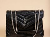 saint laurent black chevrone leather clutch bag