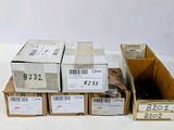 several boxes of boxes are stacked on top of each other