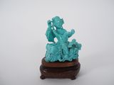 figurine chinoise en jade sculpté représentant une femme jouant de la flûte