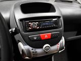 a car radio in the center of the dashboard