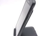 a cell phone that is sitting on top of a stand