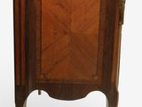 an image of a small wooden cabinet with a door on the front