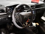 the interior of a car with a steering wheel, dashboard and dash board