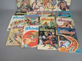 a lot of comic books on the table together