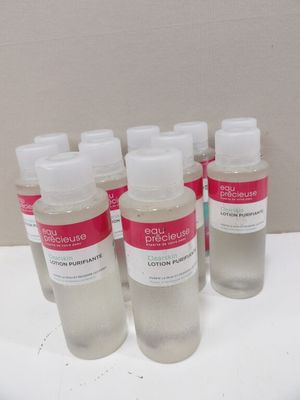 six bottles of hand sanitizer sitting on a counter top