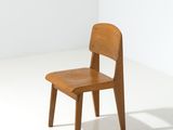 a small wooden chair sitting in a white room