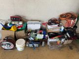 a pile of assorted items sitting on the floor