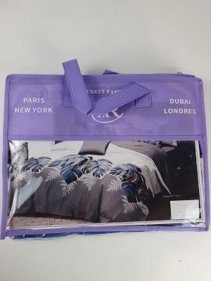 the purple bag has a picture of a bed in it