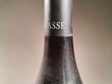 a bottle of wine that is sitting on a table