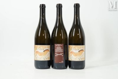 three bottles of wine sitting next to each other on a table